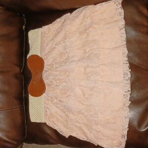 Peach colored lace skirt with connected belt